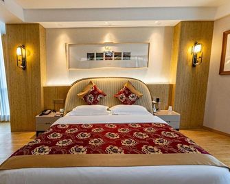 Zhuoyue Tianhe Hotel - Š-jen - Ložnice