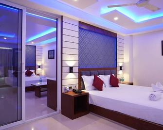Royal Gitanjali Resort & Spa - Mandarmani - Спальня