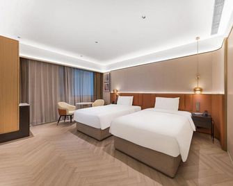 Madison Hotel Weifang Taihua City Shihu Garden Museum - Weifang - Bedroom