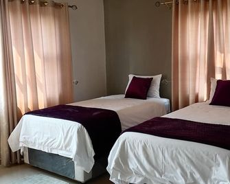 848 Guest House - Victoria Falls - Habitación