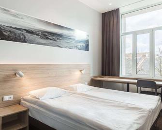 Corner Hotel - וילנה - חדר שינה