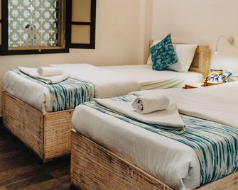 Safarnama Varanasi - A Boutique B&B - ורנאסי - חדר שינה