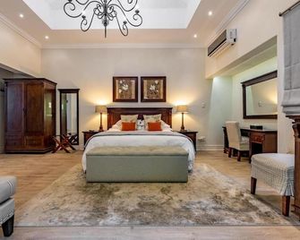 Sheppard Boutique Hotel - Nelspruit - Schlafzimmer