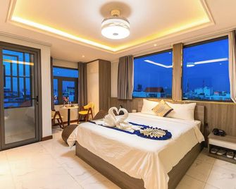 Bien Sao 2 Hotel- Nguyen Van Luong - הו צ'י מין סיטי - חדר שינה