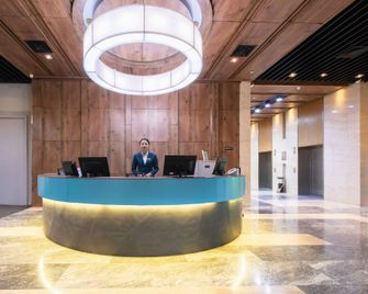 Yancheng Baolong Yiyue Select Hotel - Yancheng - Rezeption