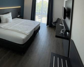 Airea Hotel - Büren - Slaapkamer