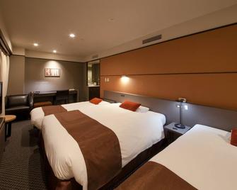 Matsuyama Tokyu Rei Hotel - Matsuyama - Bedroom