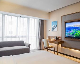 Oze Boutique Hotel (Bozhou Wanda Plaza Branch) - Bozhou - Bedroom