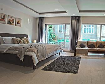 Chic 3BHK Spacious Apartment near Manipal Hospital with modern Amenities - Gangtok - Bedroom