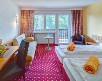 Hotel Christel - Heimbuchenthal - Спальня