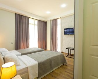 Hotel Rustaveli Kutaisi - Kutaissi - Schlafzimmer