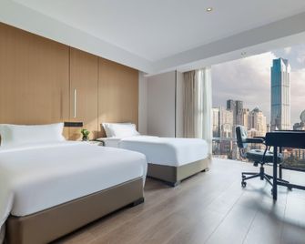 Mingyuan Holiday Hotel (Chongqing Jiefangbei) - צ'ונגקינג - חדר שינה