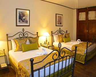 Hotel Los Balcones Leon - לאון - חדר שינה