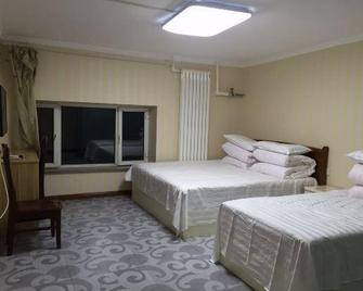 Nanhong Express Hostel - Harbin - Bedroom