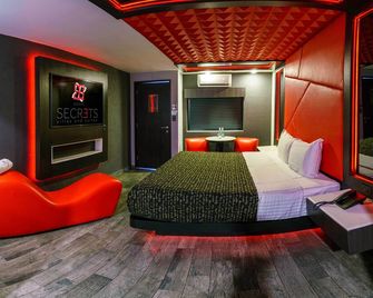 هوتل باشيون سيكريتس فيلاس آند سويتس - تولوكا - غرفة نوم