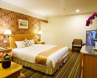 Cambridge Tainan Hotel - טאינאן - חדר שינה