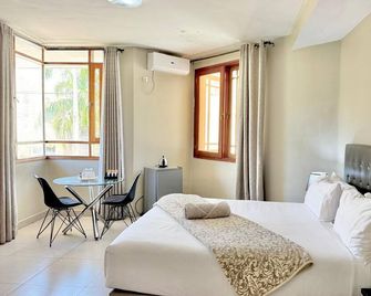 Angel Boutique Hotel - Maputo - Slaapkamer