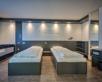 Economy-Hotel - Ulma - Camera da letto