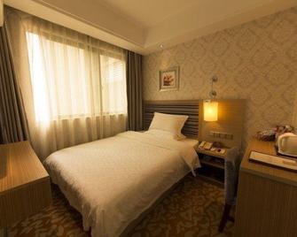 Yake Hotel - Nanning - Habitación
