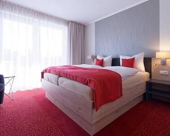 Hotel Stadt Magdeburg - Perleberg - Schlafzimmer