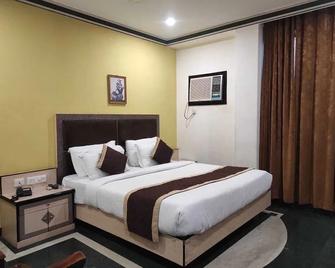 Hotel Melrose Inn - Alīgarh - Habitación