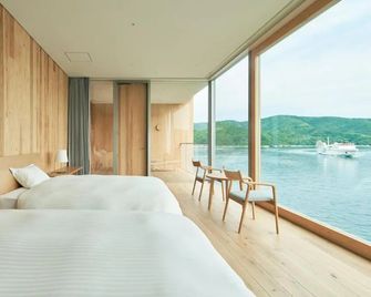 Marine Port Hotel Ama - Ama - Habitación