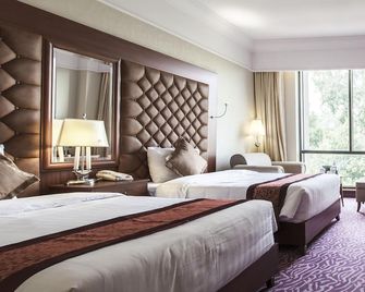 Army Hotel - האנוי - חדר שינה