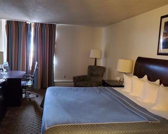 Travelodge by Wyndham Laramie - Laramie - Soverom