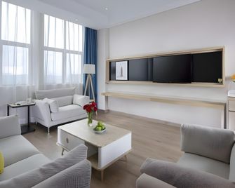 Kyriad Marvelous Hotel Huizhou Boluo Center - Chuej-čou - Ložnice