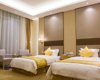 Fusheng Hotel (Qingdao Huangdao) - Qingdao - Bedroom