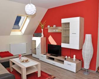 Ferienwohnungen Appartements - Ferienhaus Müritzlust - Gotthun - Вітальня