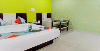 Chirom Hotel - Guwahati - Phòng ngủ