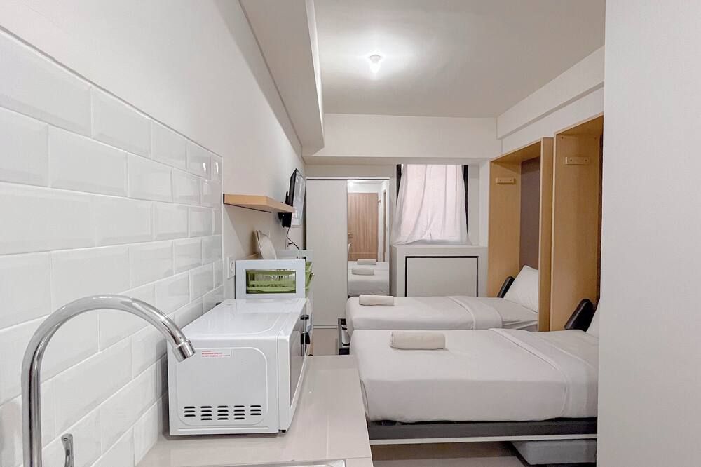 White Style Studio (No Kitchen) Apartment Bandaraya - Tallasa City Makassar - Makassar - Bedroom
