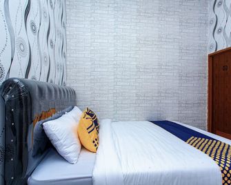 Spot On 2875 Kost Pandawa Syariah - Cilacap