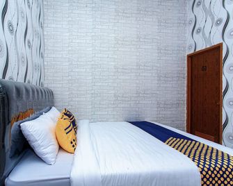Spot On 2875 Kost Pandawa Syariah - Cilacap