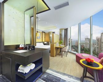 Kai Er Dun Hao Ting Hotel - Їбін - Спальня