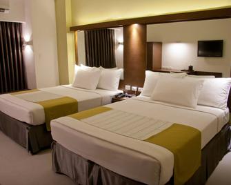 Microtel by Wyndham Acropolis - Quezon City - Bedroom