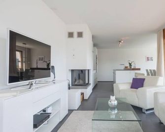 Edelweiss Casa Cassons - Flims - Living room