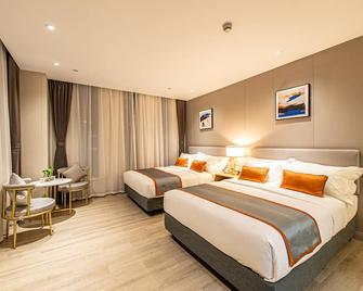Shanghai Joyful Yard Hotel-Free Shuttle Bus To Pudong Airport And Disneyland - Shanghai - Bedroom