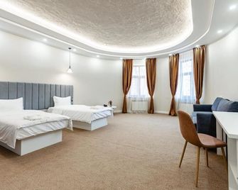 Aykun Hotel - Almaty - Bedroom