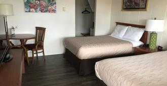 Value Lodge Economy Motel - Nanaimo - Soveværelse