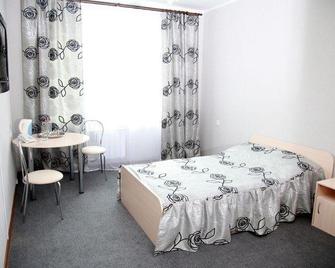 Grand City Hotel - Chita - Camera da letto