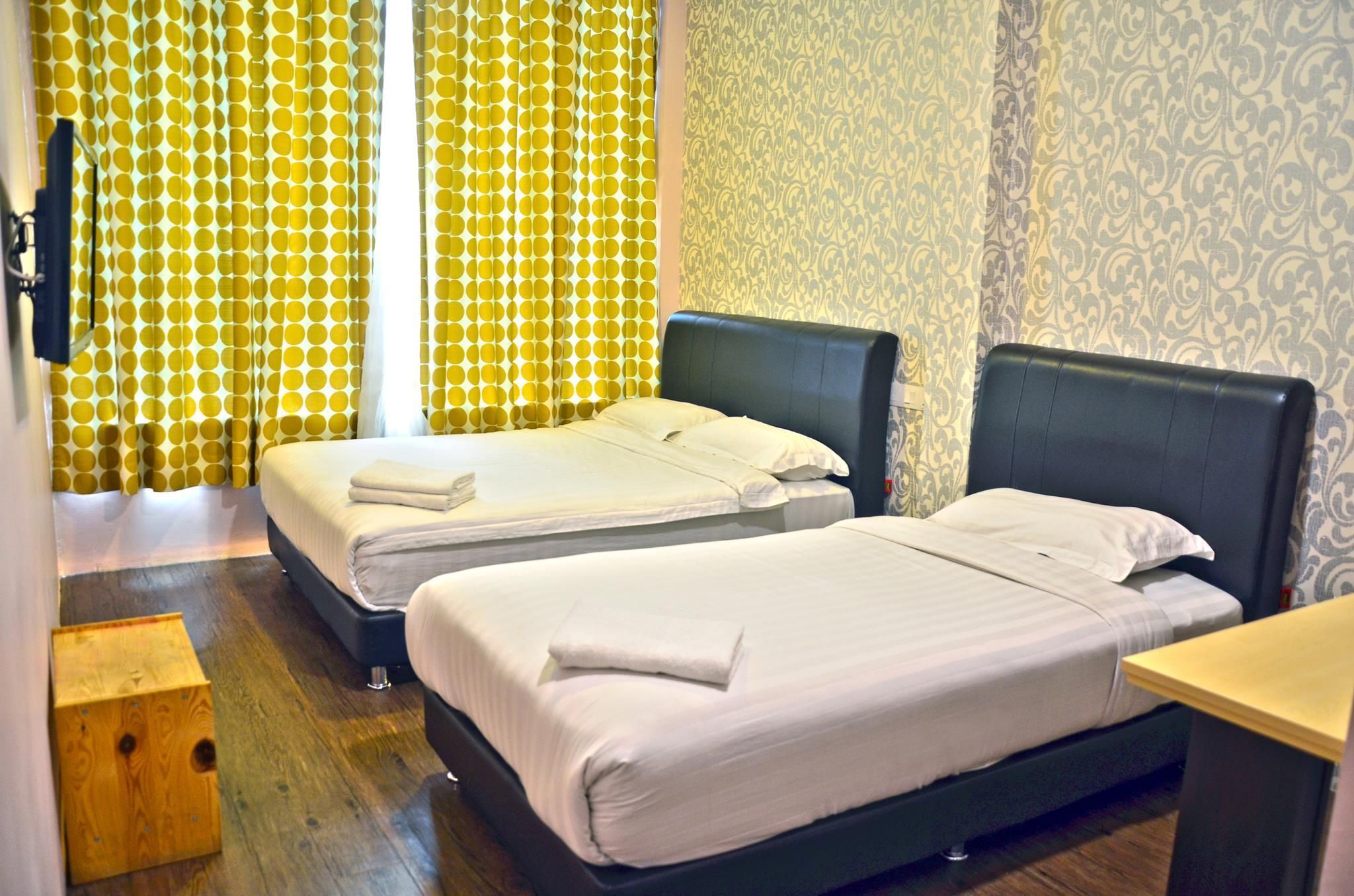 Hotel Zamburger Bentong - Bentong - Schlafzimmer