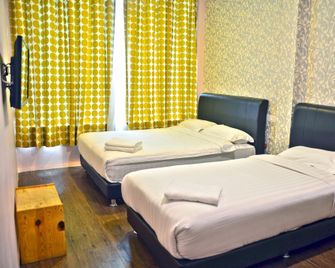 Hotel Zamburger Bentong - Bentong - Schlafzimmer