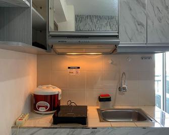 Homey And Comfortable 1Br At Cinere Resort Apartment - Depok - Kitchen