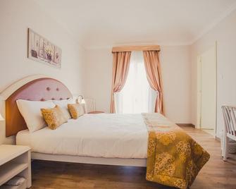 Boutique Hotel Casa Faccioli - Bologna - Schlafzimmer