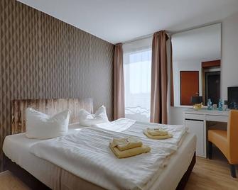 Regiohotel Leipzig West - Schkeuditz - Slaapkamer