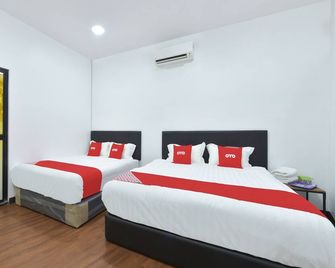 Hotel O Madeena Inn - Sepang - Slaapkamer