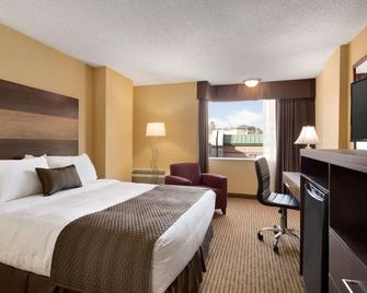 Days Inn by Wyndham Calgary South - קלגרי - חדר שינה