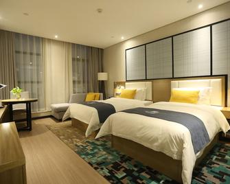 Echarm Hotel Zhengzhou High Tech Zone - Zhengzhou - Bedroom